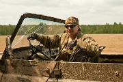 В экспедиционном джипе.